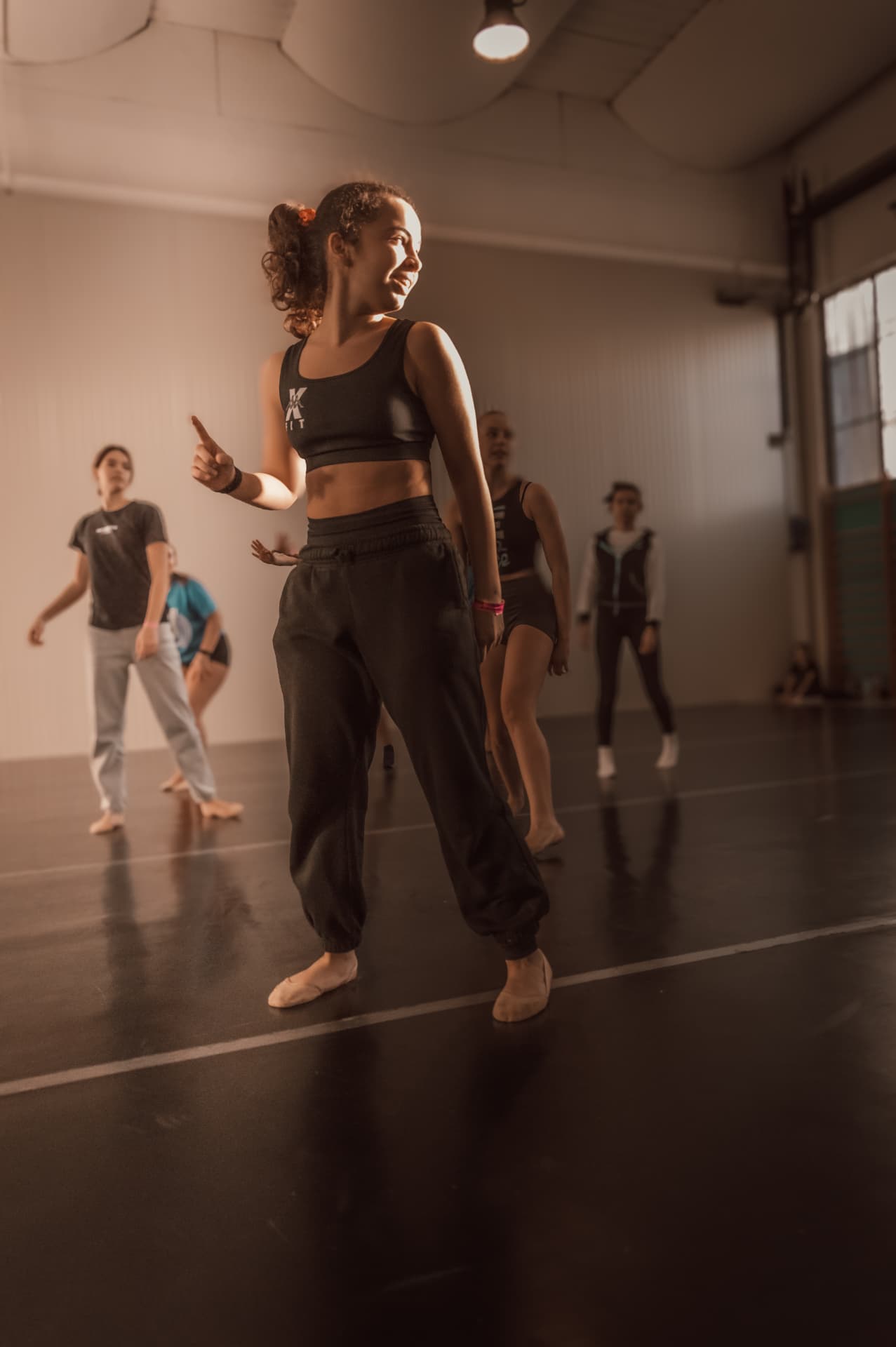 Allenatrice Intensity Elite durante una lezione in sala danza